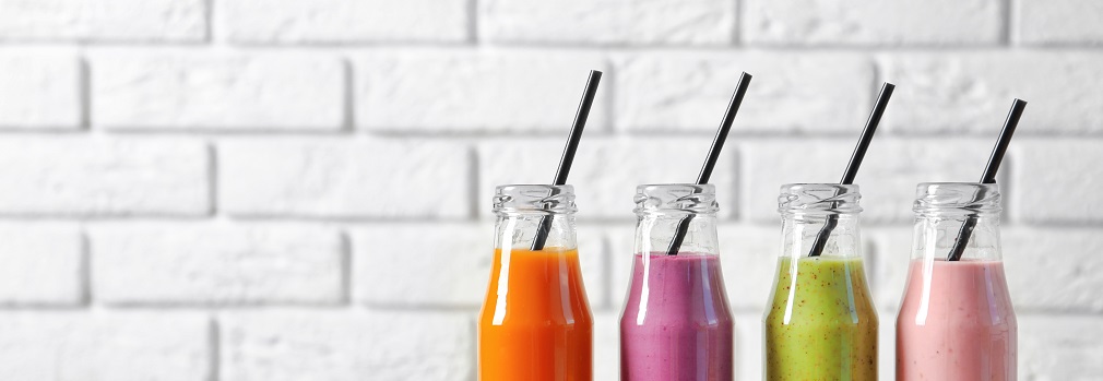 Row of bottles with smoothies