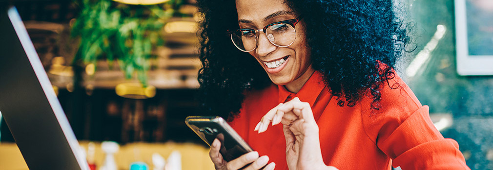 African American Women Reading on Phone Banner