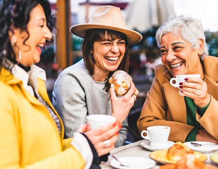 Group of women eating pastries