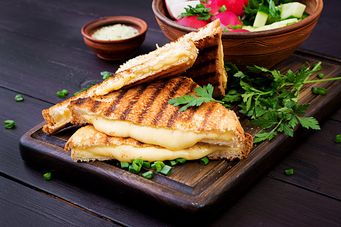 Grilled cheese sandwich with melted cheese