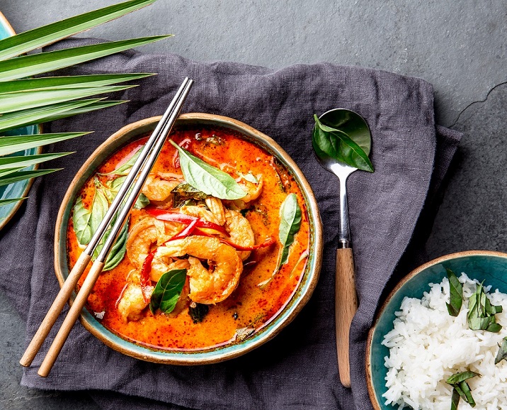 Bowl of Thai soup with shrimp