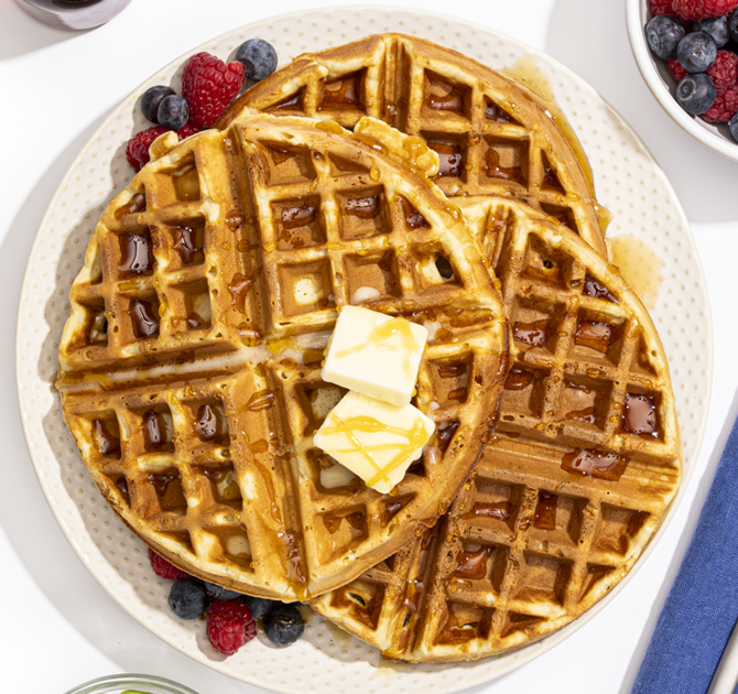 Stack of Waffles with Butter and Syrup